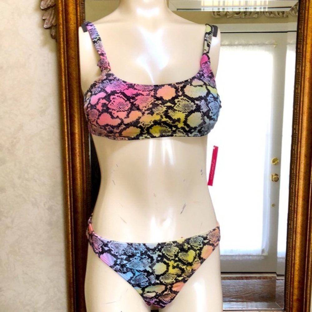 New Women’s two piece snake skin bikini.  Top size L (8-10).  Bottom size XL.
